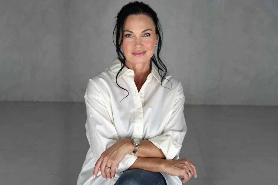 Melanie Cox in a white shirt