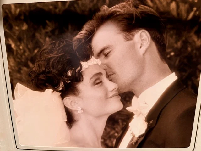 Melanie and her husband on their wedding day
